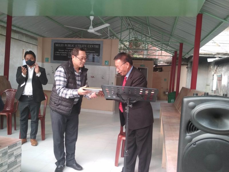 Rev L Kari Longchar handing over the charge of the Multi Public Utility Centre to DHD authority represented by Medical Superintendent, DHD, Dr Keveduyi Theyo. (Morung Photo)